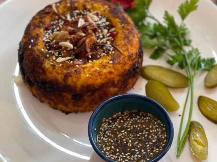 تهچین گوشت(پس گردنی گوسفندبا سس مخصوص)